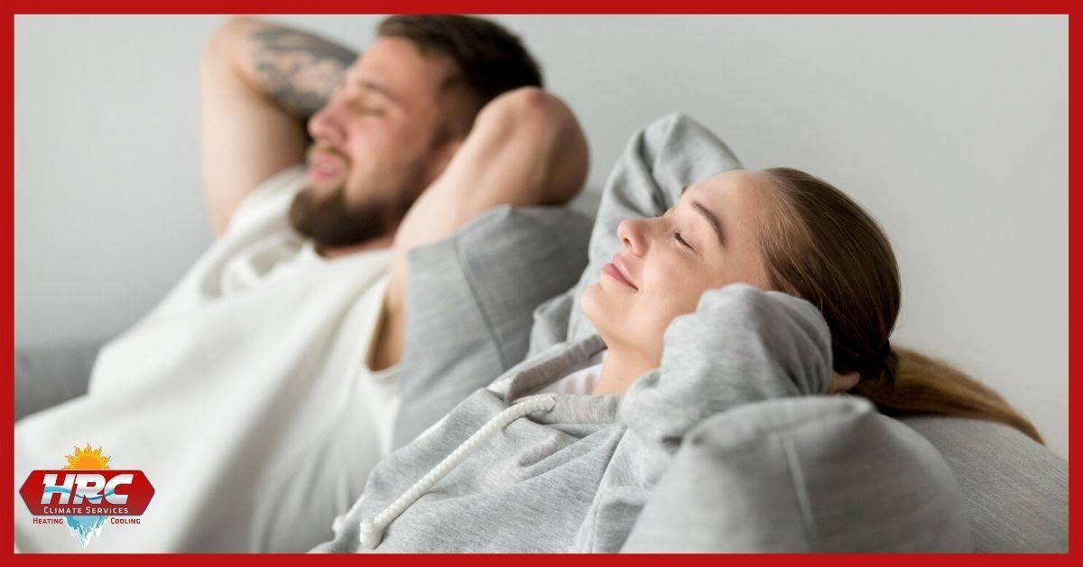 couple feeling relaxed by good air conditioning system